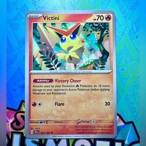 victini (021/191) - uncommon — pokémon: surging sparks
